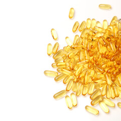 Vitamin Omega-3 fish oil capsules on white background