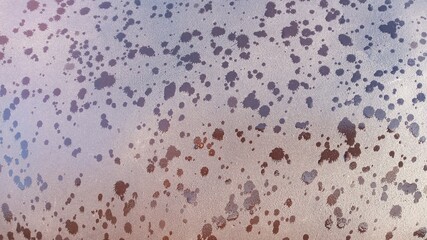 The texture of a dry brown surface covered with raindrops. Abstract background.