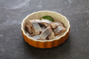Sliced herring fillet in the bowl