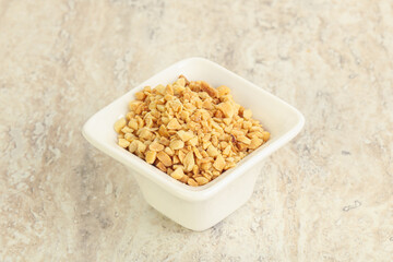 Crunched roasted peanut in the bowl