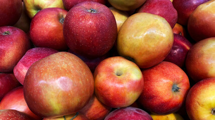 Natural background of ripe red apples