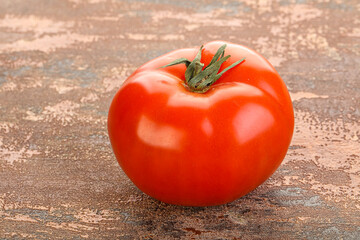 Red ripe big tomato isolated