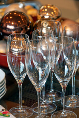 Christmas celebration party with baubles and champagne glasses