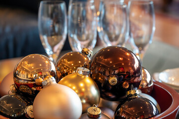 Christmas celebration party with baubles and champagne glasses