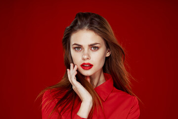woman in red shirt posing fashion red lips fun