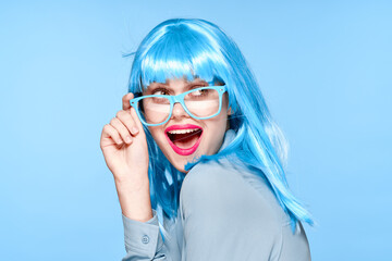 beautiful woman in blue wig glasses fashion glamor