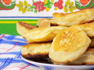 Lush pancakes cooked on kefir close-up.