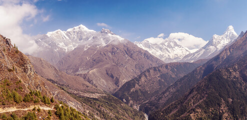 View of road from Namche Bazar to Tengboche village and Taboche, Everest, Nuptse, Lhotse, Ama Dablam mountains in the Nepal Himalayas, Everest Base Camp Trek. - obrazy, fototapety, plakaty