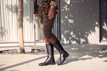 High boot for winter, Fashion blog, fashion blogger, luxury fashion, woman in dress, woman holding...