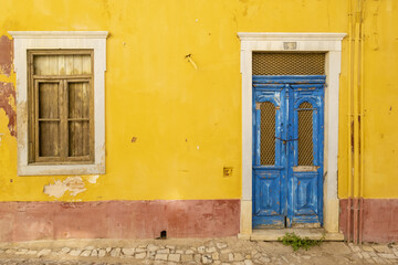 Fototapeta na wymiar old blue door in the old town of Loulé, loule, Algarve, Portugal