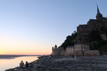 Mont saint michel architecture panoramic beautiful postcard view at Dusk in Summer Low Tide, France