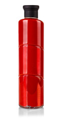 Obraz premium Bottle of red tomato juice isolated on white background with clipping path