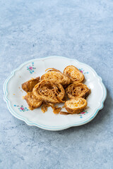 Crunchy Brittle Croissant Slices in Plate. Ready to Eat and Serve.