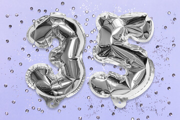 Silver foil balloon number, digit thirty five on a lilac background with sequins. Birthday greeting card with inscription 35. Anniversary concept. Numerical digit. Celebration event, template.