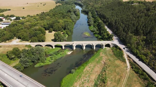 Aerial view of Nineteenth-century bridge over the Yantra River, known as the Kolyu Ficheto Bridge in Byala, Ruse region, Bulgaria