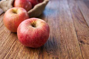 apples on a wooden table vitamins fresh fruits organic