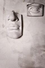 Sculpture of parts human face