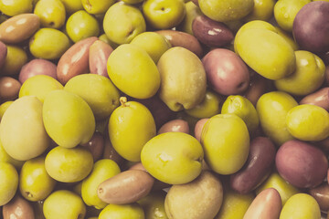 Tasty mix olives background.