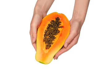 Papaya fruit isolated on a white background in woman hands. Half papaya.