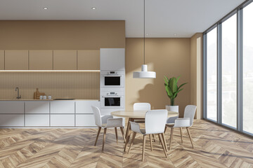 Beige kitchen interior with table and chairs, parquet floor and window