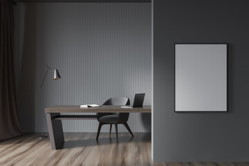 Grey office with mock up frame on wall