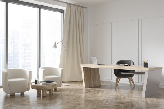 White wooden executive office with seating area