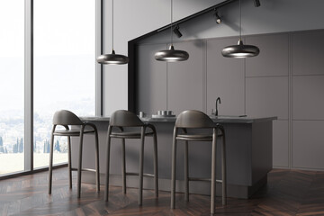 Dark kitchen set interior with table and three seats, kitchenware and window