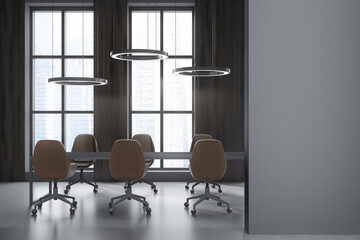 Dark conference interior with armchairs and table with lamps, mockup
