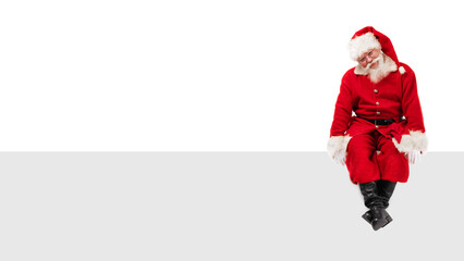 Santa Claus sitting on a blank panel
