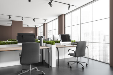 Dark office room interior with panoramic window, six desktops, armchairs