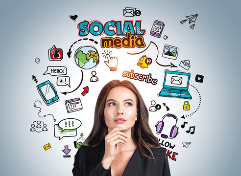 Businesswoman with different social media icons, communication and network