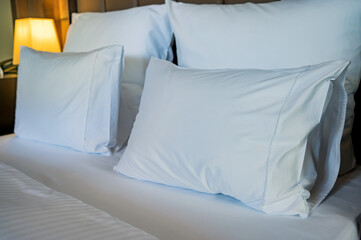 Close up white pillows on a bed
