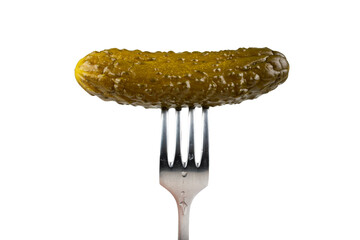 Marinated cornichon on the fork isolated on the white background