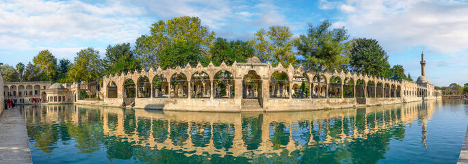 Sanliurfa, Turkey.  Balikligol (The Fish Lake). Panorama of the Pool of Abraham or Pool of Sacred Fish. Panoramic view - obrazy, fototapety, plakaty
