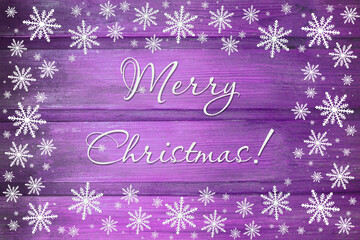 Fototapeta na wymiar Winter wooden magenta purple lilac nature background with snowflakes around. Texture of painted wood horizontal boards. Merry Christmas card.
