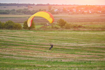 training of a paraglider in an open area