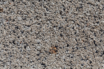 Crushed granite stones wall - close up