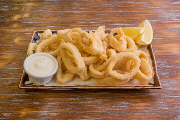 Served Andalusian battered squid served as tapas in a Spanish restaurant