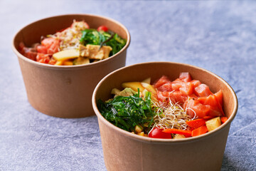 Delicious take away poke bowls on a concrete surface