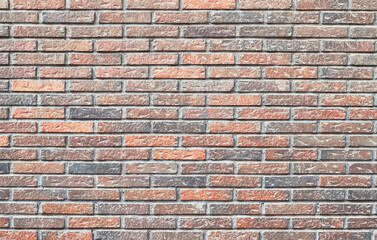 Brick wall texture with cracked tiles and cement. Classic brickwall surface background