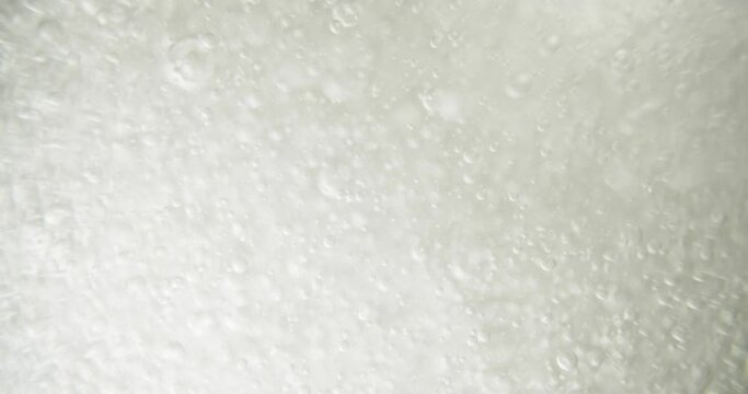 Liquid and bubbles as background footage