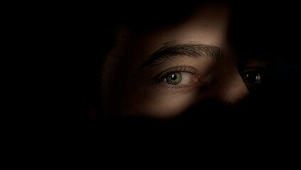eyes in the shadows
