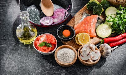 Fototapeta na wymiar Fresh food ingredients prepared for cooking on a kitchen table