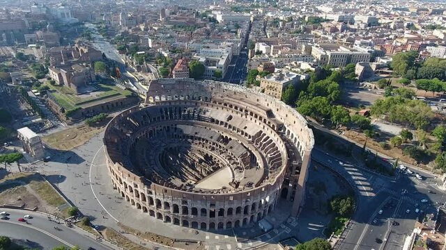 Aerial drone view of the Colosseum an oval amphitheatre in centre of city of Rome Italy just east of the Roman Forum it is the largest ever built and a popular tourist attraction 4k high resolution