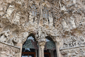 Barcelona, Spain - 22 Nov, 2021: Details from the East Door of the Sagrada Familia Cathedral,...