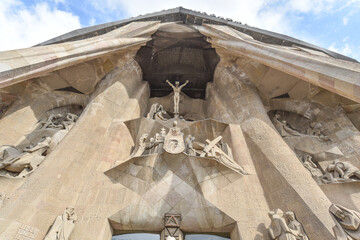 Barcelona, Spain - 22 Nov, 2021: Statues on the exterior of the Sagrada Familia designed by...