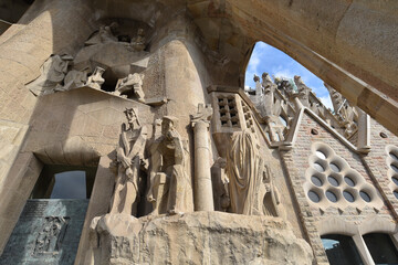 Barcelona, Spain - 22 Nov, 2021: Statues on the exterior of the Sagrada Familia designed by...