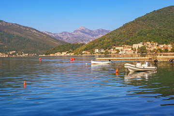 Fototapeta na wymiar Beautiful Mediterranen landscape. Montenegro, Adriatic Sea. View of Bay of Kotor near Tivat city on sunny autumn day