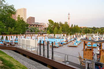 Recreation area in the restaurant "River Beach" in the park of the Northern River Station, Moscow, Russian Federation, July 10, 2021