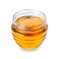 Glass jar with honey isolated on white background